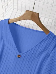 Blue V-neck knit sweater detail view, elegant vertical ribbed texture casual daily top.