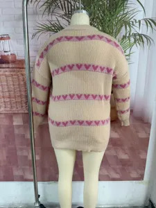 Detailed back view of women round neck beige knit sweater with cute pink heart stripe patterns.