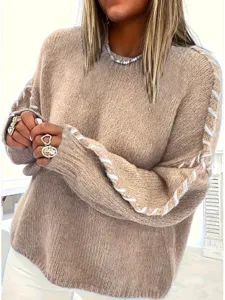 Women's casual knit sweater featuring stylish side lacing long sleeves and comfortable fit.