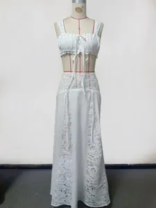 White sexy two-piece beach dress bikini cover-up set with delicate lace cutout details.