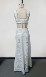 White hollow lace two piece crop top and long skirt beach cover up set detail view.