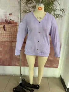 Casual V-neck vertical striped knitted cardigan for women, loose fit, stylish early spring top.