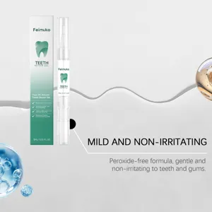 Detailed closeup of Feimuko teeth repair gel pen and packaging showing gentle formula.