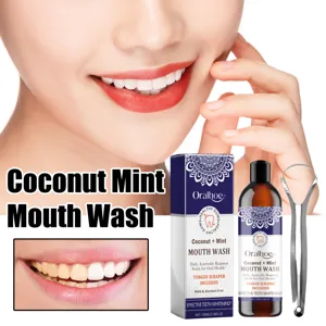 Oralhoe coconut mint mouthwash with tongue scraper for fresh breath and teeth whitening.