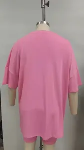 Women casual pink short sleeve loungewear set back view, comfortable loose pajama style.