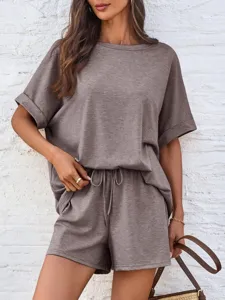 Casual summer two-piece lounge set with oversized short sleeve tee and drawstring shorts.