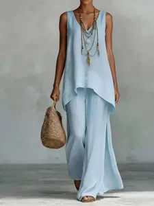 Bohemian style casual light blue outfit detail, showcasing sleeveless v-neck top and wide leg pants.