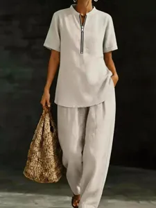 Completo due pezzi top manica corta e pantaloni lunghi tinta unita moda estiva dettaglio