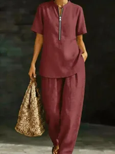 Completo da donna casual a tinta unita con top a manica corta e pantaloni lunghi estivo.