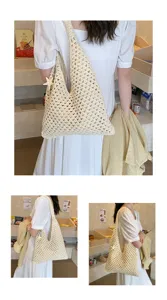 Detailed view of cream handmade crochet hollow-out tote bag for summer beach styling