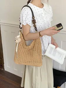 Korean style hollow crochet woven tote bag with dark wooden beaded strap for women