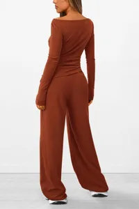 Back view of a stylish brown long sleeve asymmetrical top and wide leg pants casual set.