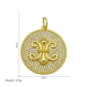 18k gold plated round pendant with fleur-de-lis motif and pave zirconia, 38mm height