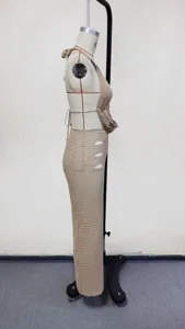 Beige knit crochet two-piece beach cover up set halter top hollow long skirt detail view