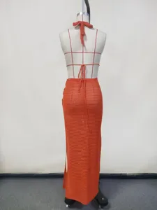Detailed back view of the orange crochet beach dress set, showcasing the open-knit texture clearly.