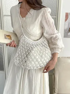 Elegant handmade white macramé hollow-out woven tote bag for beach and summer