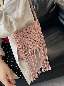 Bohemian hand-woven pink cotton macrame shoulder bag with fringe tassels for summer