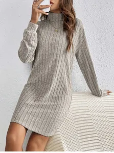 Close-up view of the ribbed turtleneck knit sweater dress, highlighting the soft texture.