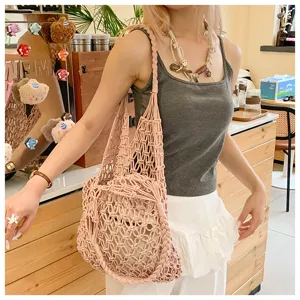 Pink macrame woven cotton rope tote bag with drawstring inner pouch