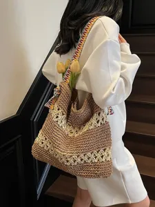 Handgefertigte Stroh-Tragetasche mit ausgehöhltem Blumenmuster für Strand und Reise