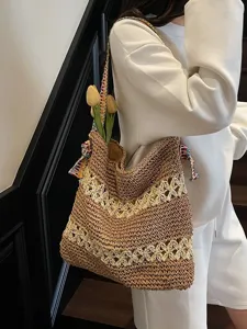 Lässige gewebte Stroh-Einkaufstasche mit Blumen-Hohlmuster für Strand oder Alltag.
