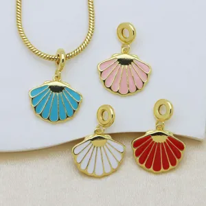 Detail view of 18K gold plated colorful enamel seashell charms for necklaces.