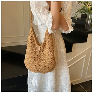Handmade crochet sunflower shoulder bag with intricate hollow knit texture for women
