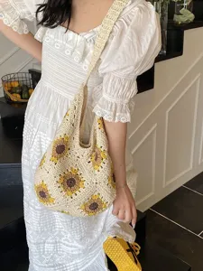 Handmade crochet cotton thread shoulder bag featuring vivid sunflower patterns for women