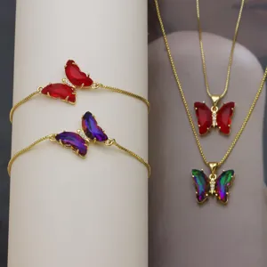 Detailed close-up of colorful zircon butterfly bracelets and necklaces with exquisite gold plating.