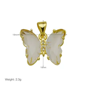 Close-up detail of a stunning gold plated crystal butterfly pendant with size and weight.