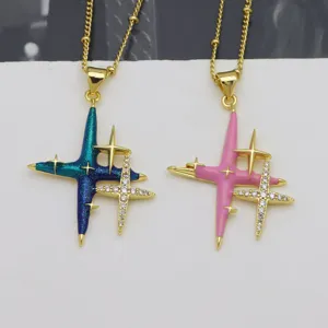 Gold plated star pendant necklace with colorful enamel and sparkling crystal details.