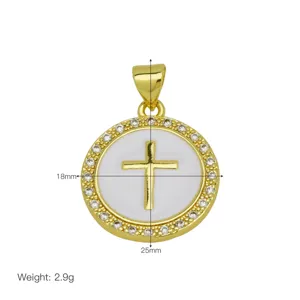 Close-up detail of the gold-plated round cross pendant with white enamel and sparkling zircon stones.