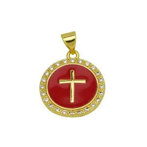 Gold plated red enamel cross pendant detail, sparkling crystal halo around the round center.