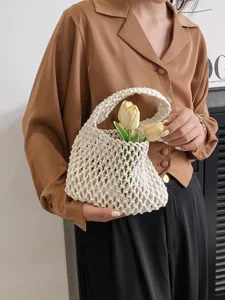 Sac à main tissé à la main en corde de coton pour femmes, élégant fourre-tout de plage.