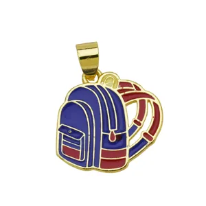 Colgante de mochila esmaltado y bañado en oro, hermoso detalle de joyería escolar colorida.