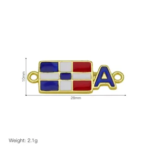 Detailed view of gold-plated enamel alloy jewelry connector charm with letter A design.