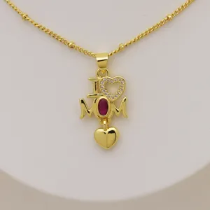 Gold color Mom love pendant necklace with sparkly cubic zirconia and red gem details.