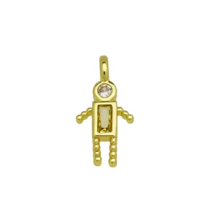 Macro detail of robot pendant charm in 18K gold plating with clear square cubic zirconia.