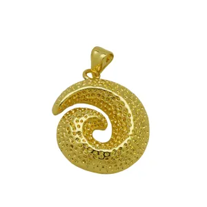 Macro view of 18K gold plated conch pendant showing detailed textured surface finish