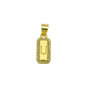 Detailed view of 18K gold plated rectangular pendant with zircon border and letter U