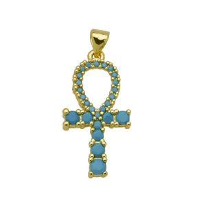 Elegante colgante Ankh dorado para collar con incrustaciones de piedras turquesas