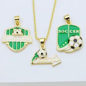 Soccer themed gold chain necklace with green white enamel sports pendants accessory detail.