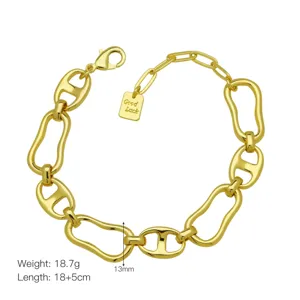 Close-up details of the gold-plated chunky link bracelet showcasing its unique link design.