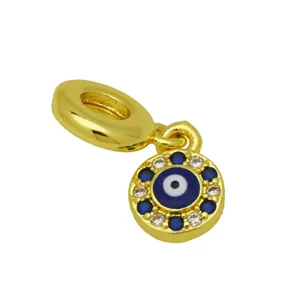 Gold Evil Eye charm detail showcasing blue enamel and sparkling cubic zirconia stones.