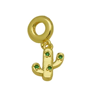Gold cactus charm pendant with sparkling green cubic zirconia for snake bone bracelets detail.