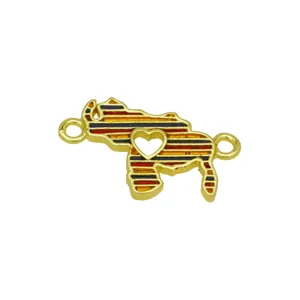 Detailed closeup of golden enamel map charm connector with heart cutout and red yellow blue stripes.