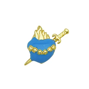 Exquisite blue enamel heart pendant detail featuring a golden dagger and flame design.