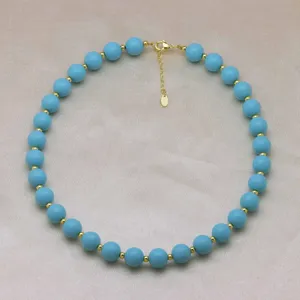 Collier de perles bleu turquoise avec perles intermédiaires dorées bijou fait main