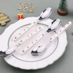 Christmas stainless steel spoon set with cute holiday handle designs, perfect for gifts.