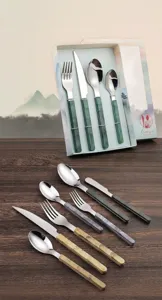 Stainless steel cutlery set with elegant marble pattern handles, perfect for dining.